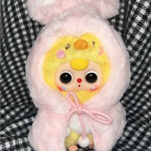 Baby Three duck with pink bunny robe.